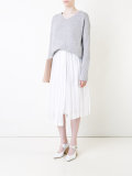 bouclé sweater with asymmetric hem