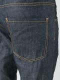 'Skater' creased effect jeans
