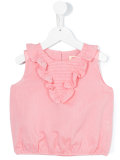 sleeveless frill top