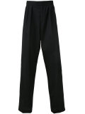 wide-legged pleated trousers