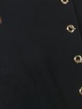 dislocated button fastening dress