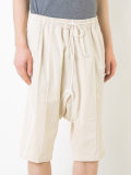 drop-crotch track shorts