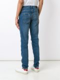 distressed slim jeans