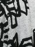 'Imago' macro coat