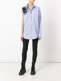 Crash embellished asymmetric shirt