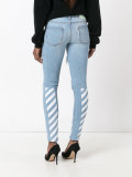 ripped drawstring skinny jeans