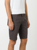 shorts with button closure flap pockets