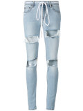 ripped drawstring skinny jeans