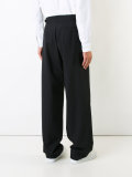 wide-legged pleated trousers