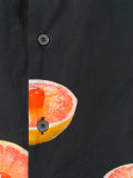 orange print shirt