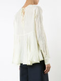 ruffled semi-sheer blouse