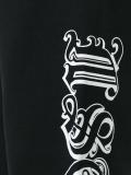 goth tattoo print track shorts
