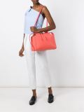 piped shoulder bag