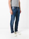 Slim lightly distressed jeans