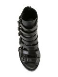 buckled straps boots