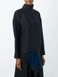 loose-fit turtleneck blouse