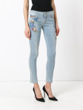 floral patch skinny jeans