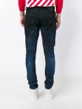 distressed tapered jeans