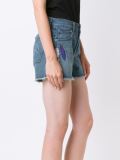 embroidered feather denim shorts