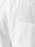 creased effect trousers