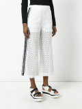 layered cut out trousers 