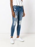 distressed skinny jeans