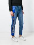 racing stripe tapered jeans