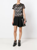 camouflage and star print T-shirt