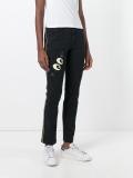 'look' patch slim-fit trousers