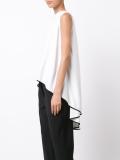 cascading tail sleeveless blouse