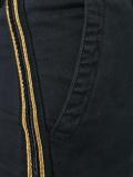'look' patch slim-fit trousers