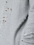 distressed sweater