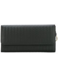 embossed fold-over clutch 