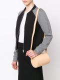 cylinder sling crossbody bag