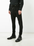 dropped crotch skinny trousers