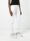distressed slim-fit trousers