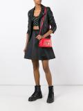 lion pin crossbody bag