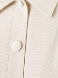 pleated sleeveless coat