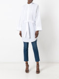 curved hem blouse