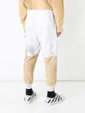 distressed patched track pants