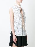 star studded blouse