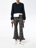 checked ruffle hem trousers