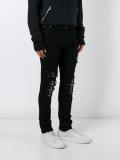 distressed effect skinny jeans