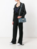 triangle lock cross body bag