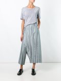 drop-crotch pleated trousers