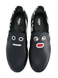 faces embellished slippers