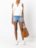 scalloped hem denim shorts