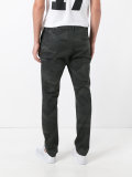 camouflage print trousers