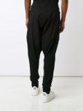 drop-crotch track pants