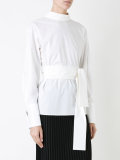 back button fastening shirt